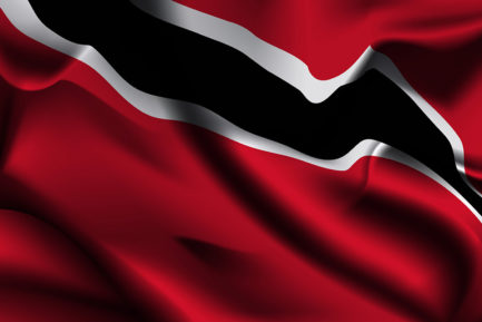Flag of Trinidad and Tobago. Realistic waving flag of Republic of Trinidad and Tobago. Fabric textured flowing flag of Trinidad and Tobago.